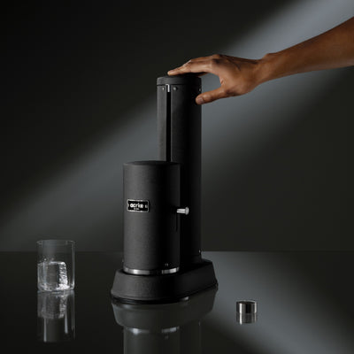 CO2 cylinder installation on Aarke Carbonator Pro in Matte black black finish, showing durable stainless steel construction.