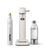 Aarke Carbonator 3 in Matte white displayed with a 100% renewable CO2 cylinder next to a filled PET water bottle.