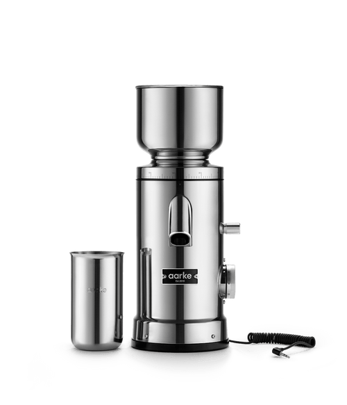 Front product image of the Aarke Coffee Grinder and its stainless steel container, with the power cord extended.