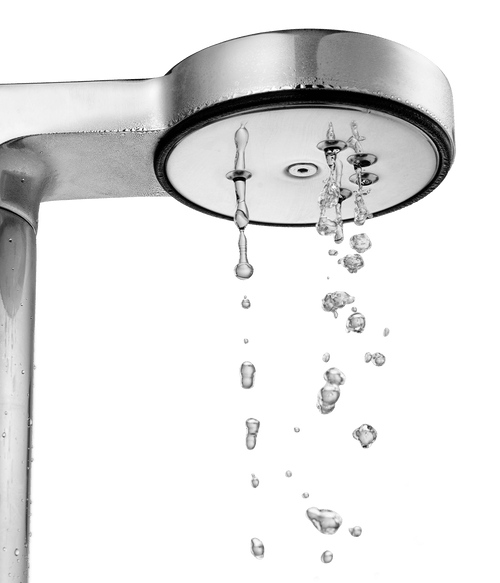 Close-up of the Aarke Coffee Maker’s water outlet releasing hot water evenly for brewing.