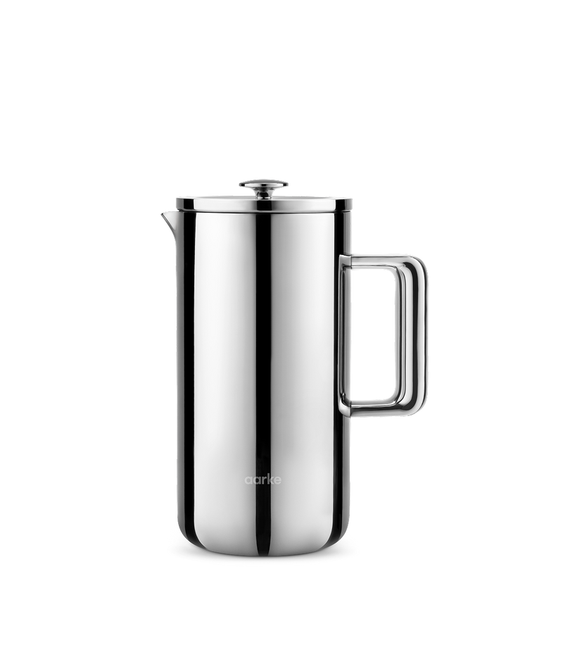 Front view of the stainless steel Aarke French Press with lid closed and sleek handle.