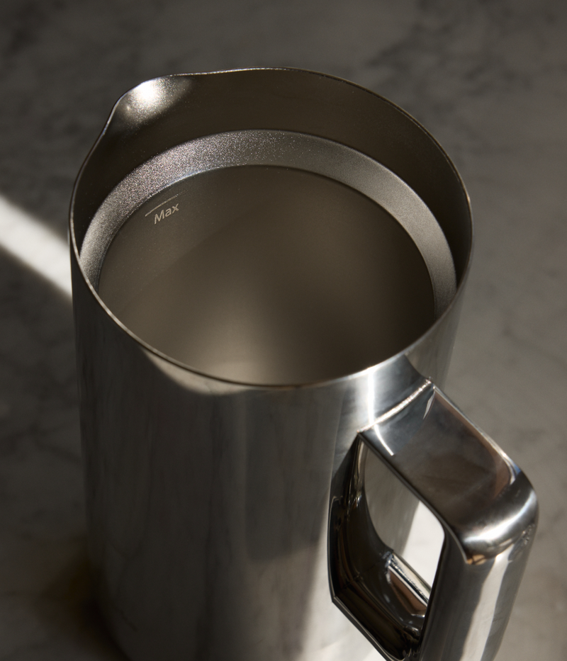 Close-up of Aarke stainless steel French Press interior with max fill line.