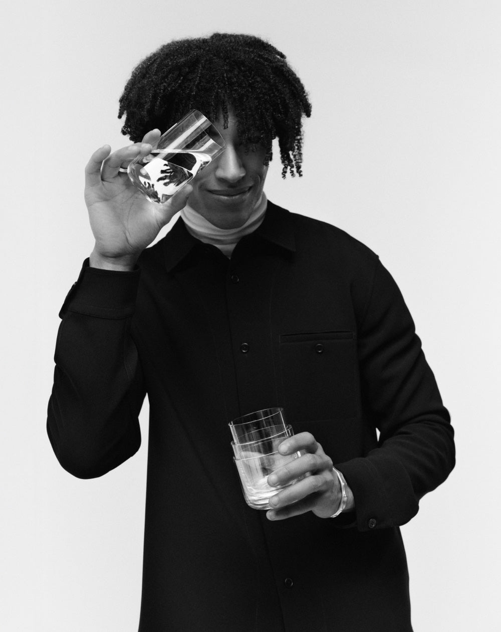 Person holding an aarke nesting glass.