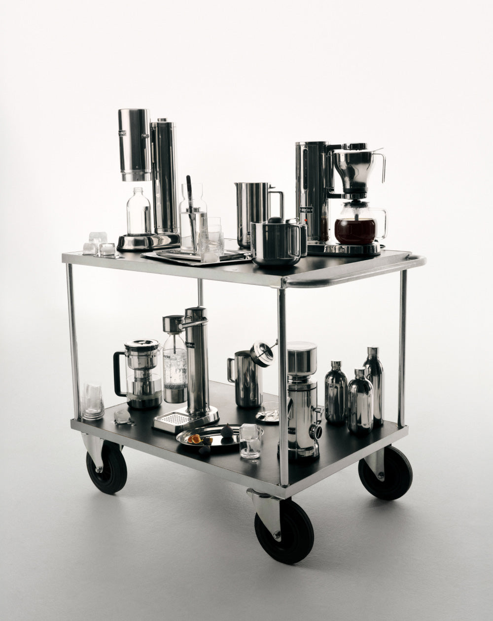 Aarke products, full sortiment on a metal cart with a white background