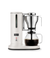 Aarke matte white automatic pour-over coffee maker with stainless steel filter brewing coffee into glass carafe.